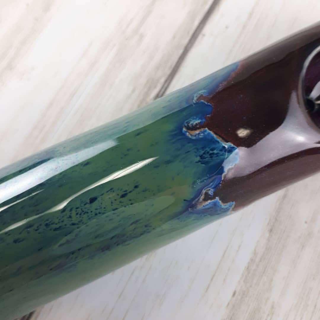 Nebula Original Cannabis Pipe, galaxy inspired black, blue, purple and green hazy/drippy colours, close up