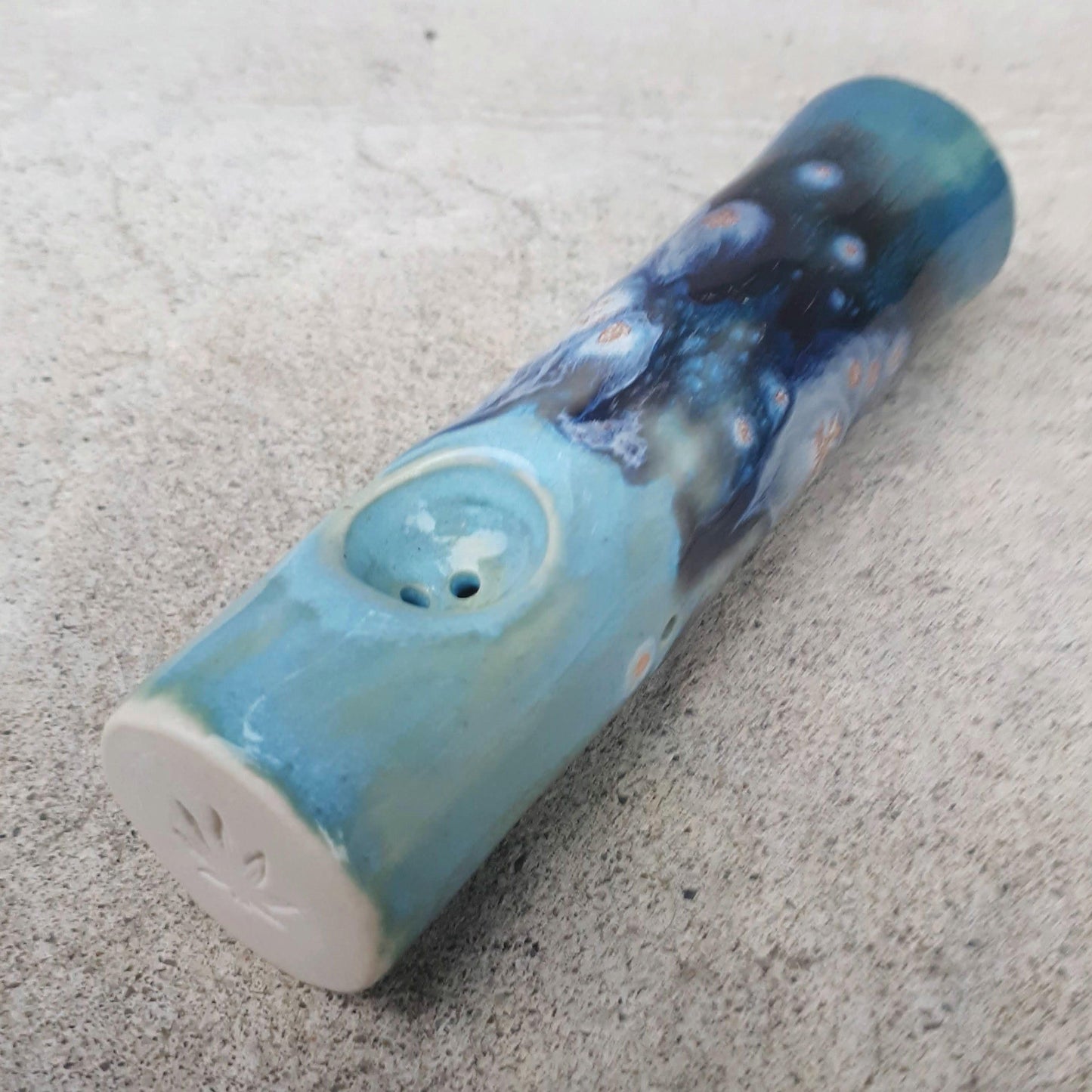 Side view of Blue Dream original cannabis pipe with hole on side